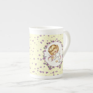 Tasse En Porcelaine Premier Pâques du bébé. Petit ange avec agneau