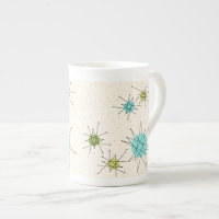 Tasse atomique iconique de porcelaine tendre de