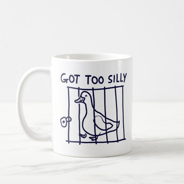 Tasse "Est devenu trop idiot" Canard en cage (Gauche)
