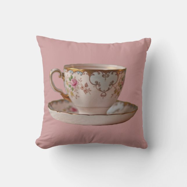 Tasse et soucoupe de thé rose avec le coussin de (Recto)