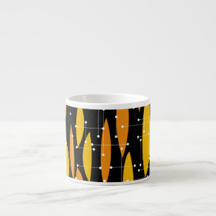 Tasse Expresso Style atomique, motif géométrique noir orange.