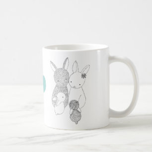 Tasse heureuse de mère d'amour de famille de lapi