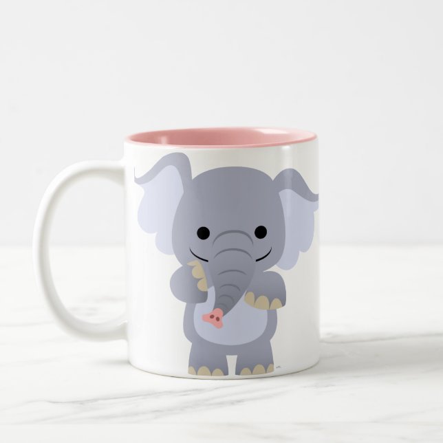 Tasse heureuse d'éléphant de bande dessinée (Gauche)