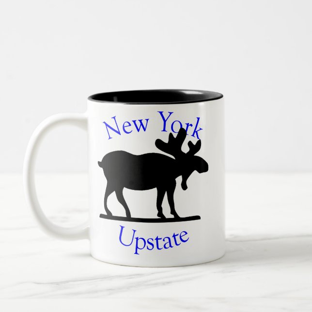 Tasse hors de la ville d'orignaux de New York (Gauche)
