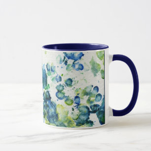 Tasse irlandaise d'or avec des accents