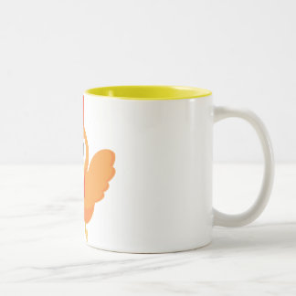 Tasse jaune de flèche