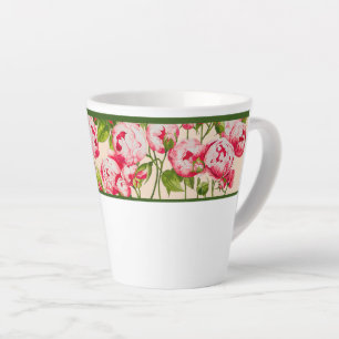 Tasse Latte Abondance rosée sur une petite boue en latte (B)