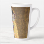 Tasse Latte Le baiser de Gustav Klimt<br><div class="desc">The Kiss by Gustav Klimt The Kiss est une peinture à l'huile sur toile avec de la feuille d'or, de l'argent et du platine. par le peintre symboliste autrichien Gustav Klimt. Il a été peint à un moment donné en 1907 et 1908, au plus fort de ce que les savants...</div>