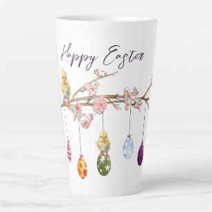 Tasse Latte Oeufs de Pâques sur la branche de floraison Joyeux