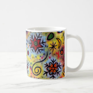 Tasse lunatique et colorée de flocon de neige