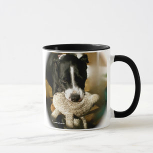 Tasse mignonne de chien de délivrance