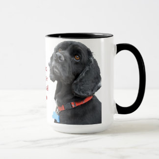 Tasse noire de tête de cocker