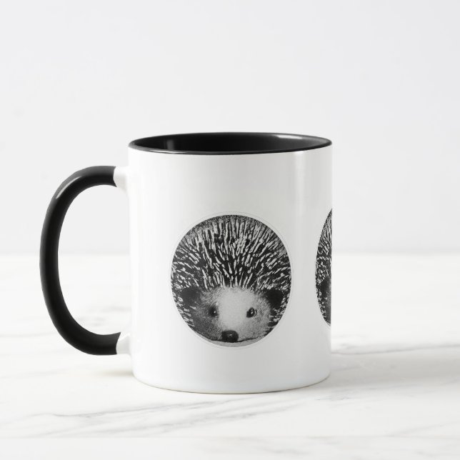Tasse noire et blanche de hérisson (Gauche)