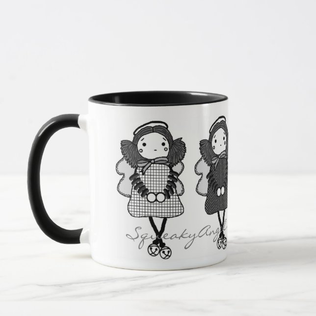 Tasse noire et blanche de SqueakyAngels (Gauche)