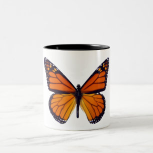 Tasse orange de papillon