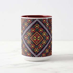 Tasse orange des soleils de broderie de Vyshyvanka