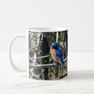 Tasse orientale heureuse d'oiseau bleu