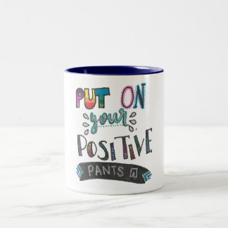 Tasse positive de pantalon