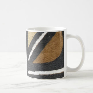 Tasse rayée de tissu de boue