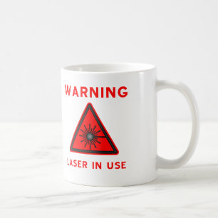 Tasse rouge de symbole d'alerte laser