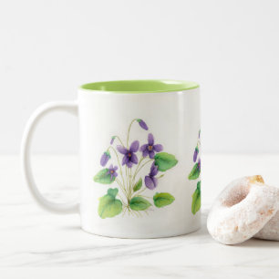 Tasse sauvage de violettes d'aquarelle