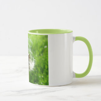 Tasse verte de pissenlit