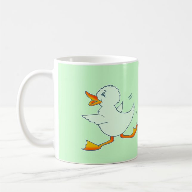 Tasse verte en bon état de canard de Quackers (Gauche)