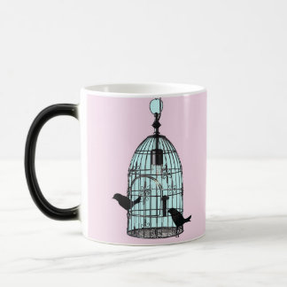 Tasse vintage de cage à oiseaux avec le monogramme