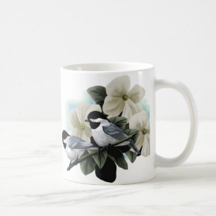 Tasses de chickadee couvertes par noir