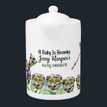 Tea Party Baby shower Floral Blue Teapot après-mid<br><div class="desc">Faites-le dans le style - une mignonne Tea Party Baby shower où vous pourrez goûter les différentes saveurs du thé et célébrer l'arrivée du bébé. L'illustration présente une théière et des tasses à thé à fleurs bleues entourées de feuillage vert et d'arrière - plan vert. Juste pour la fête du...</div>