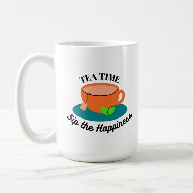 tea time mignon tasse orange et feuilles verts (Gauche)