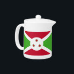 Teapot avec drapeau du Burundi<br><div class="desc">Ajoutez une touche de fierté burundaise à votre tea time avec notre théière exclusive avec le drapeau du Burundi ! Réalisée avec une attention minutieuse aux détails, cette théière est plus qu’un simple élément de cuisine fonctionnel, c’est une célébration du patrimoine et de la fierté culturelle du Burundi. Le design...</div>