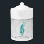 Teapot Peacock turquoise et élégant<br><div class="desc">Profitez de votre thé avec une théière personnalisée Peacock Turquoise et élégante. Le design de la théière présente un paon vibrant,  orné d'un feuillage délicat et d'un arrière - plan gris clair. Autres cadeaux disponibles avec ce design ainsi qu'une variété de couleurs.</div>
