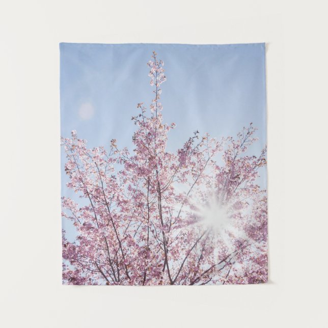 Tenture sun rays pass through pink flowers of a wow tree (Devant)
