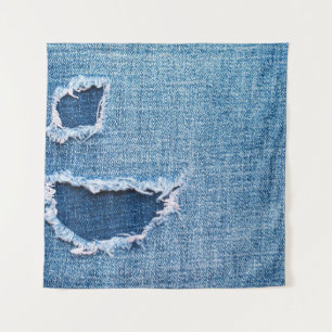 Tenture Tissu en denim déchiré, teintes bleues.