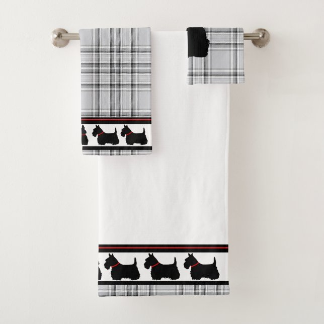 Terrier écossais/collier rouge/plaid rouge/frontiè (En situation)