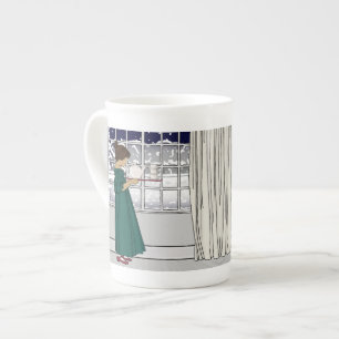 Thé dans une tasse de porcelaine tendre de tempête