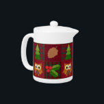 Thé de Noël Woodland<br><div class="desc">Holly,  les cônes de pin,  un sapin et une chouette joyeuse habillent votre table pour des vacances divertissantes sur cette charmante théière. Coordonnez votre maison avec toute la collection de Noël Woodland!</div>