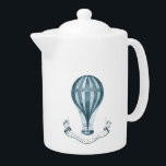 Théière chaude vintage de ballon à air<br><div class="desc">Ballon à air chaud vintage au-dessus d'une bannière qui lit des "vols de fantaisie".</div>