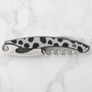 Tire-bouchon Motif de fourrure de vache noir et blanc en arrièr
