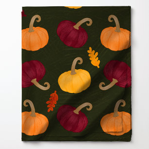 Tissu Citrouilles d'automne et feuilles sur motif vert