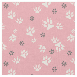 Tissu Empreintes de chien sur un arrière - plan rose