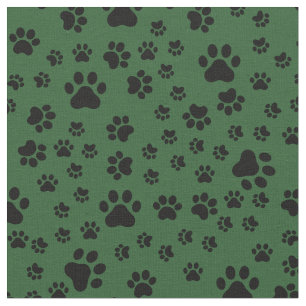 Tissu Empreintes de pattes noirs sur vert