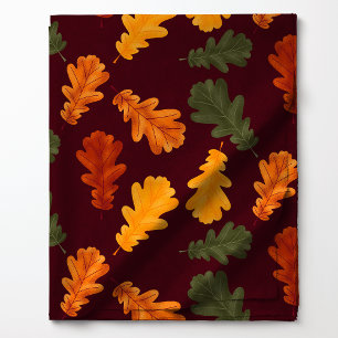 Tissu Feuilles de chêne d'automne sur fond rouge à motif