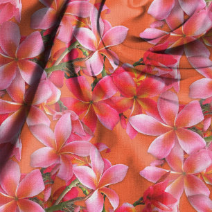 Tissu Fleurs roses de Plumeria hawaïen sur orange