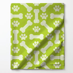 Tissu Os de chien verts et blancs et motif d'empreintes 