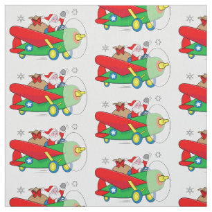 Tissu Père Noël pilotant l'avion avec des cadeaux