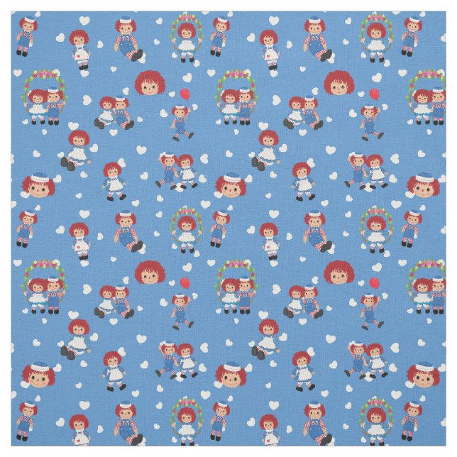 Tissu Raggedy Ann et Andy sur des cœurs tombants sur fon (Échantillon)
