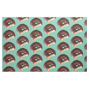 Tissu Sauce de gâteau jaune glacé au chocolat sur vert