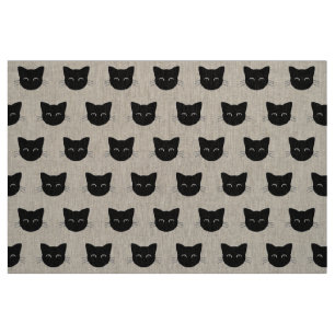 Tissu Un mignon chat noir face à un motif